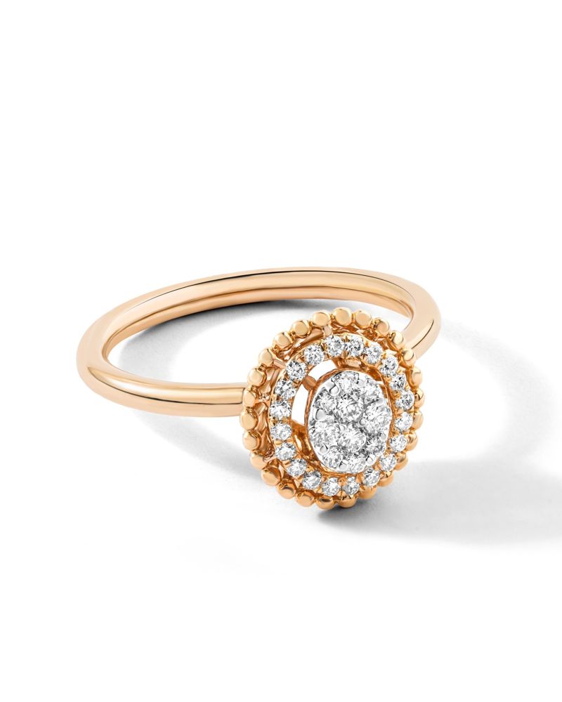 Oval diamond cluster with a beaded halo in rose gold