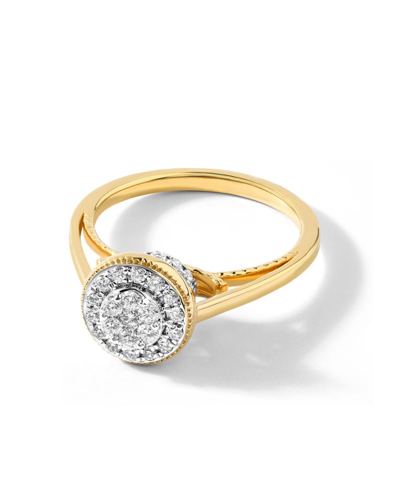Round diamond cluster halo with milgrain edges and a split shank in yellow gold